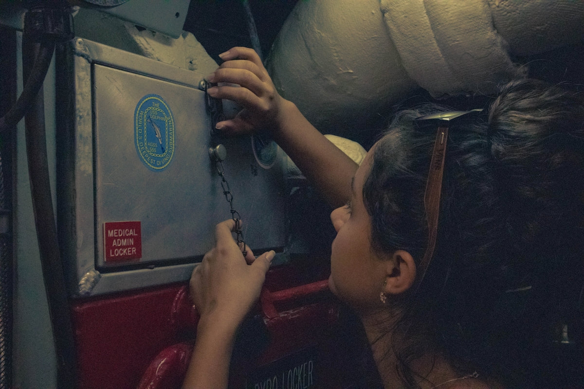 woman wears black frame sunglasses
