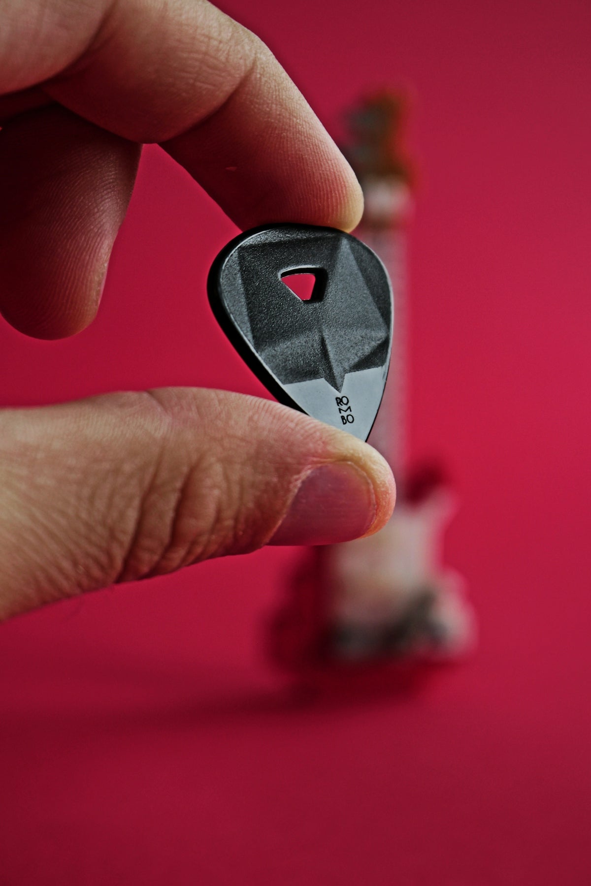 person holding black and white heart shaped ornament