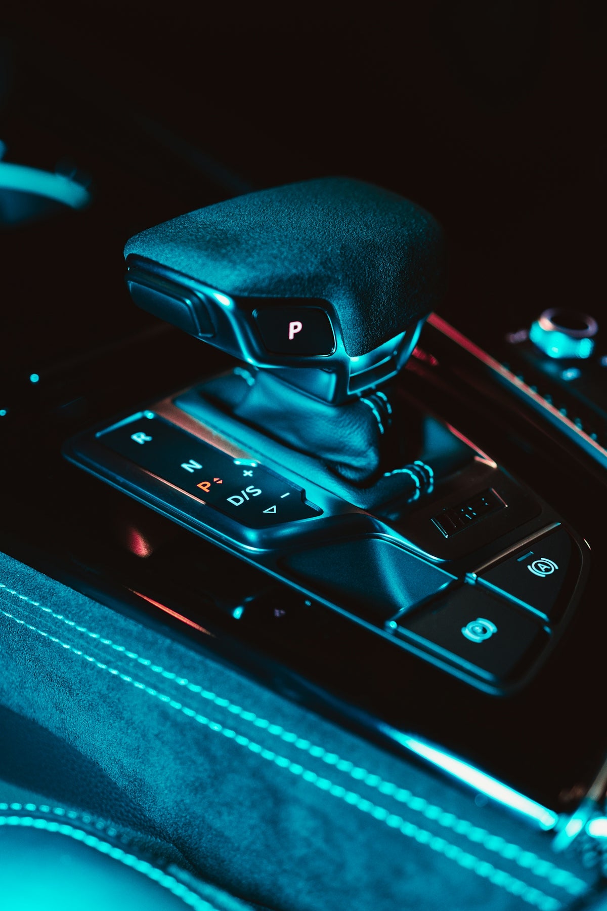 a close up of a car's gear box