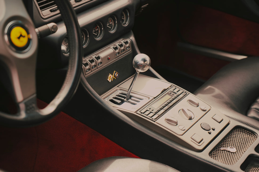 a steering wheel and dashboard of a car