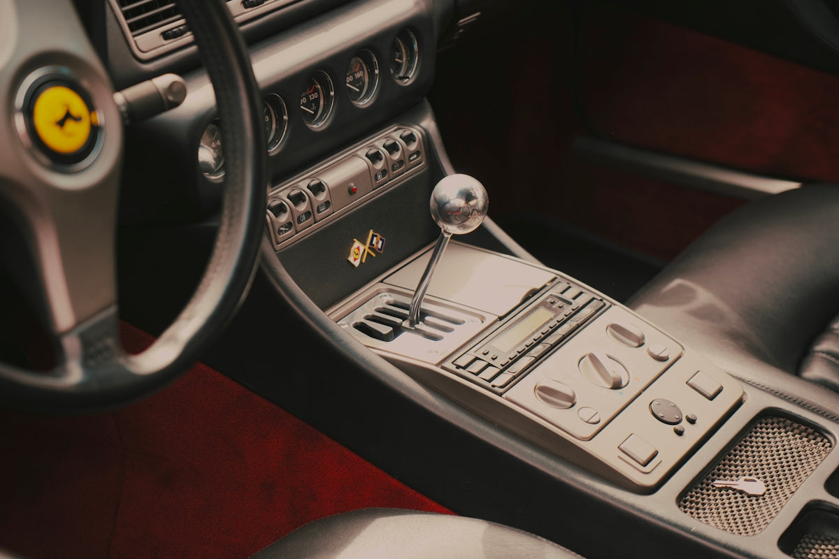 a steering wheel and dashboard of a car