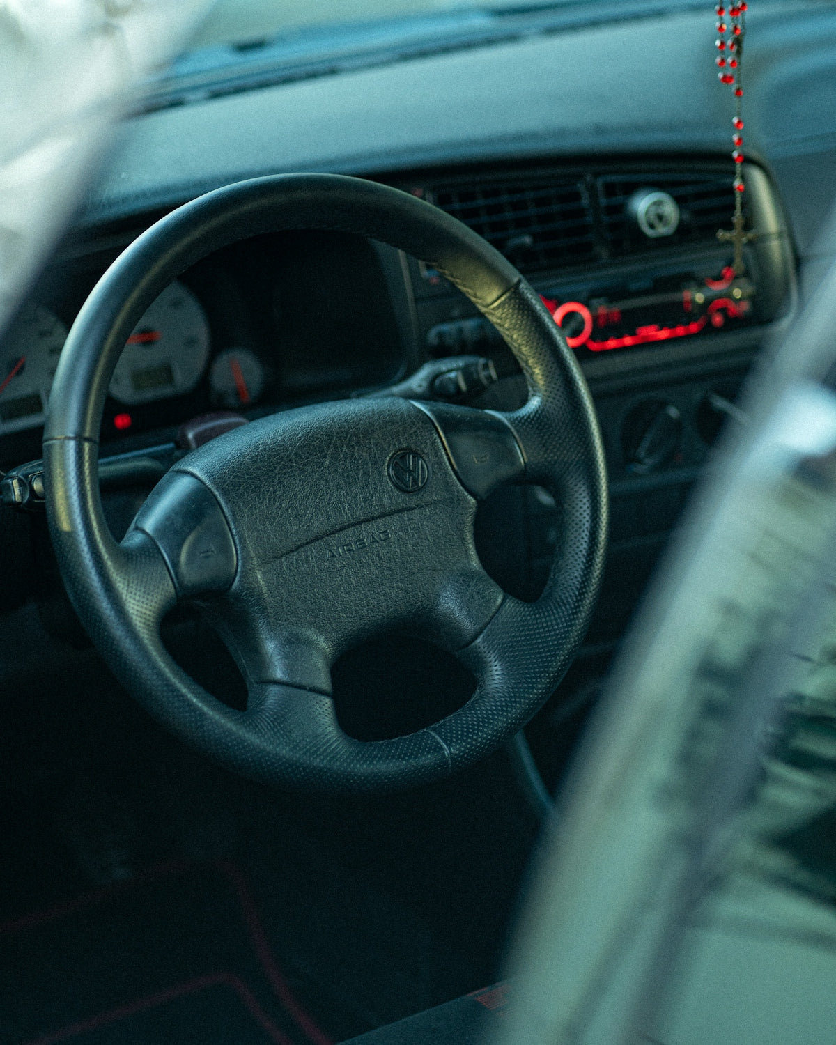 a steering wheel and dashboard of a car