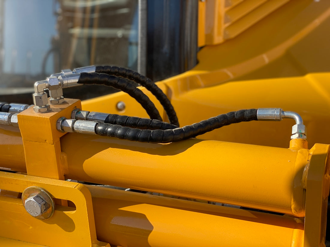 a close up view of a yellow machine