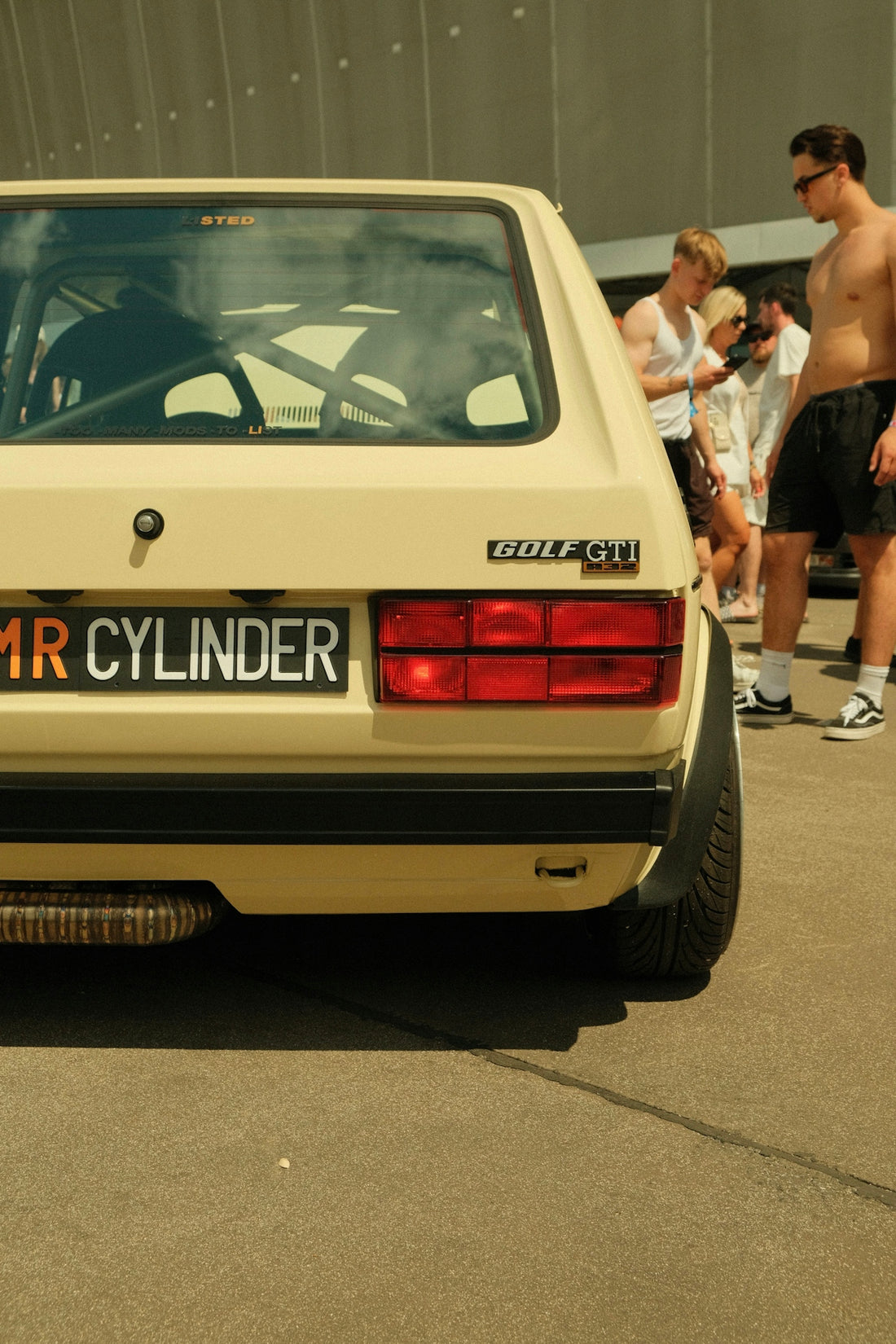 A retro volkswagen golf gti car, ready to race.