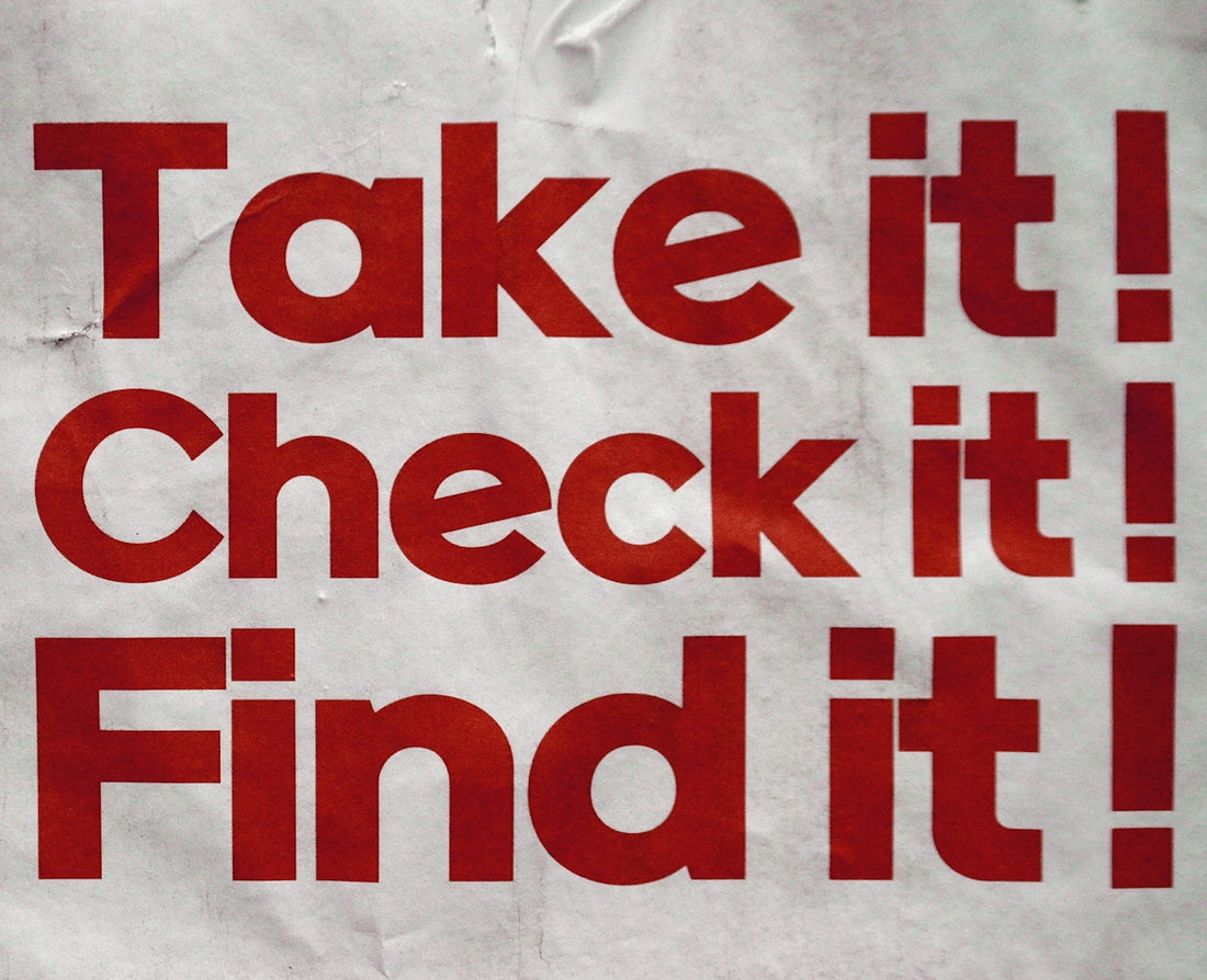 Red text on white paper says take it! check it! find it!