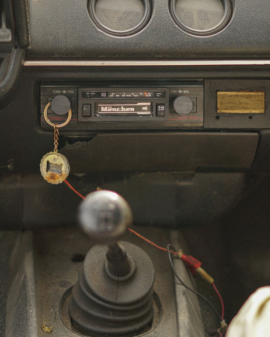 Vintage car dashboard with radio and gear stick