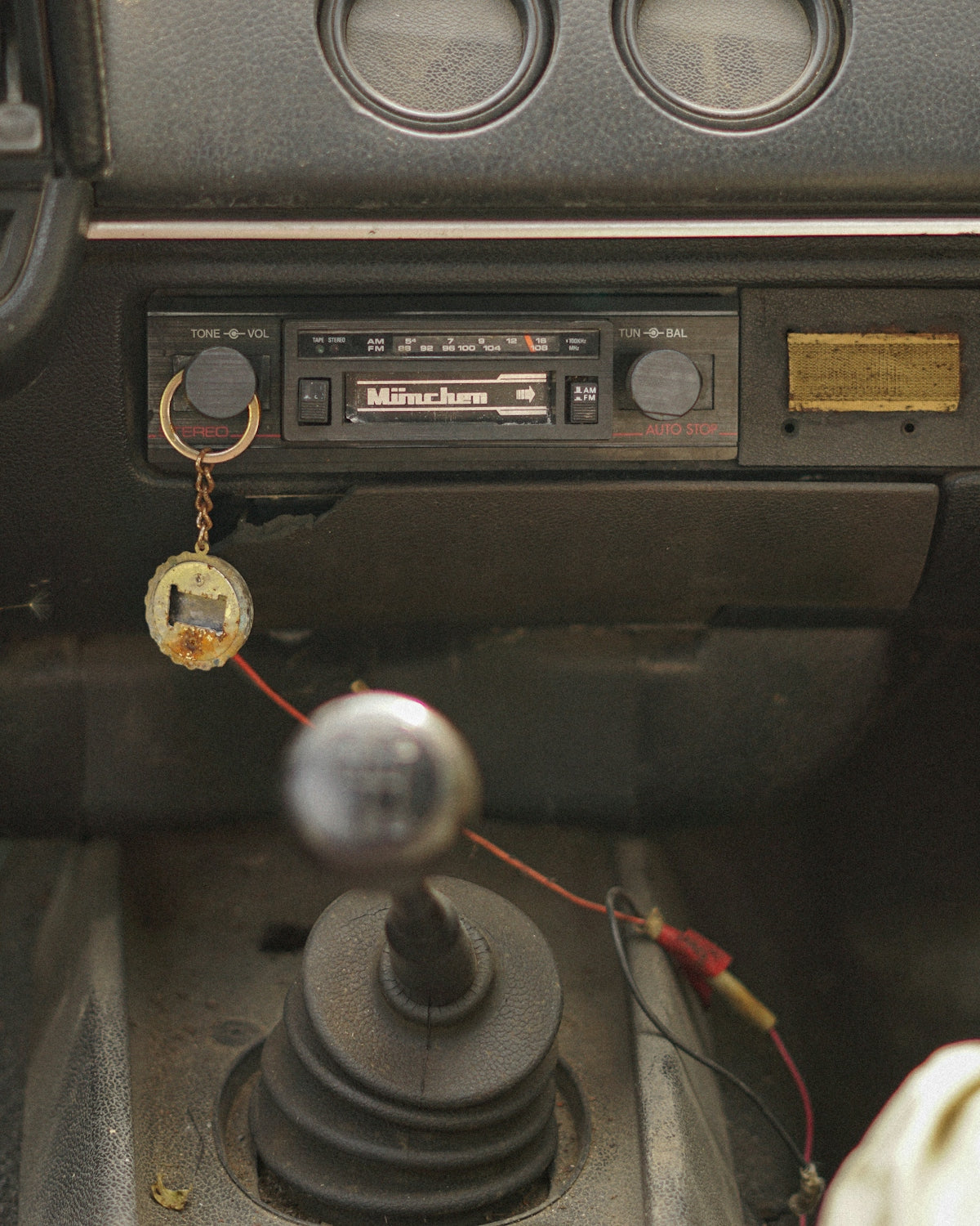 Vintage car dashboard with radio and gear stick